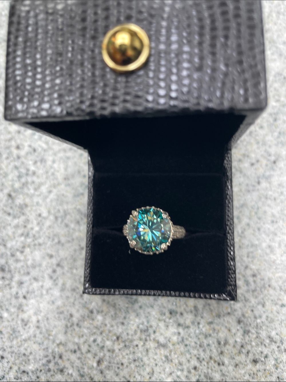 Silver Ring with Teal Blue Round Center Stone